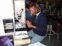 Susan sorting and identifying benthos by species.