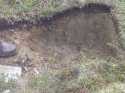 Note the different depths of soil where frost action has squeezed up ise into a lens shaped mound.